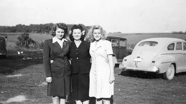 Great aunt Francis and others standing in a field, 1945
