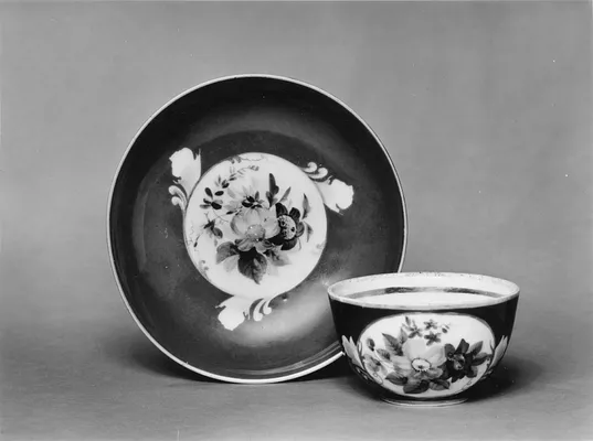 Cup and Saucer with Floral Decoration
