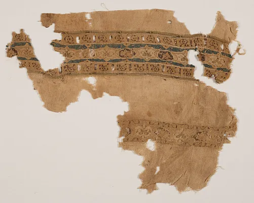 Tiraz fragment with decorative bands of roundels and stars