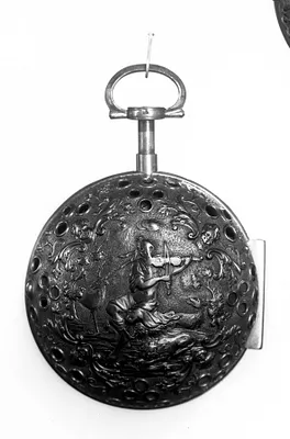 Watch in a double case decorated with a relief of Orpheus playing a violin with animals