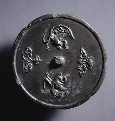 Lobed Mirror with Paired Phoenixes and Floral Displays