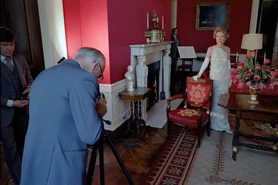 Nancy Reagan in the Red Room during photo session with Horst Horst for Vogue Magazine