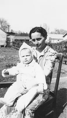 Woman Holding Baby Outdoors, 1945