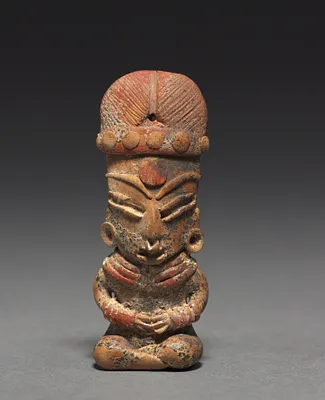 Seated Female Figurine