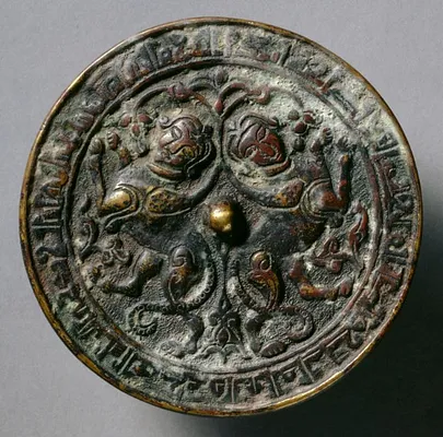 Mirror with Addorsed Sphinxes