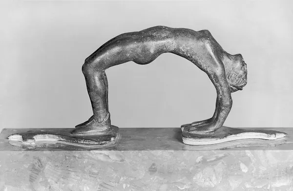 Cista Handle in the Form of a Woman Somersaulting