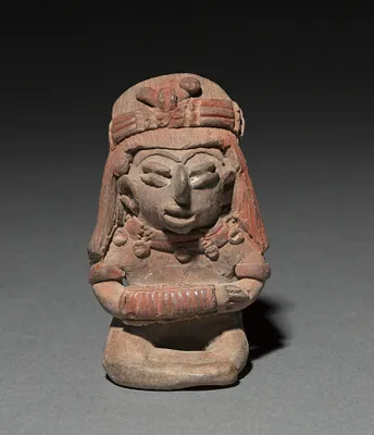 Seated Figurine Wearing a Bracelet