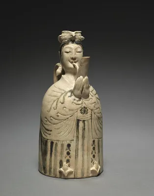 Ewer in the form of a Sheng Player