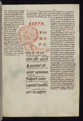 Initial ""Q"" with a dragon
