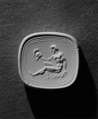 Intaglio with a Warrior Holding a Helmet Set in a Ring