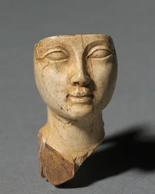 Face from a Cosmetic Spoon