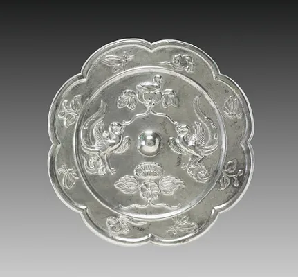 Lobed Mirror with Paired Phoenixes, a Nestling Bird, and a Lotus Blossom