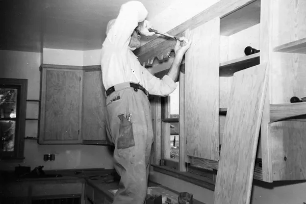 Carpenter Working on Cabinets, 1951