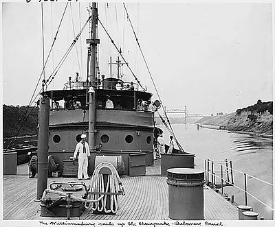 Photograph of President Truman's yacht, the U.S.S. WILLIAMSBURG, sailing up the Chesapeake and Delaware Canal, during the President's vacation cruise to Rhode Island and Bermuda