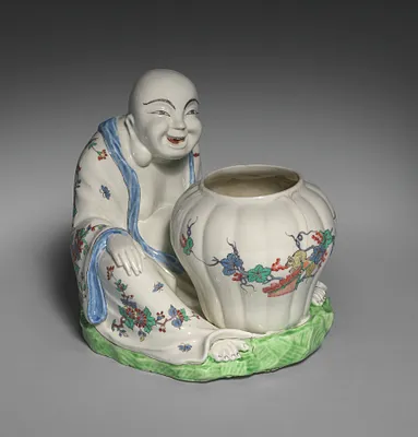 Figure of a Chinese with Jar