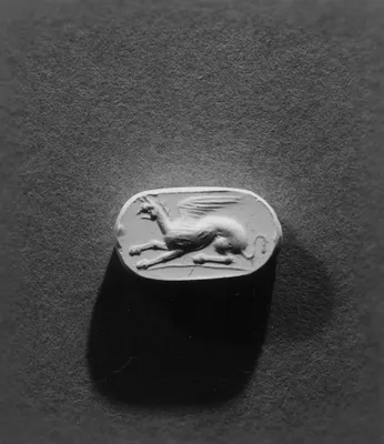 Scarab or Scaraboid Intaglio with a Griffin Set in a Swivel Ring