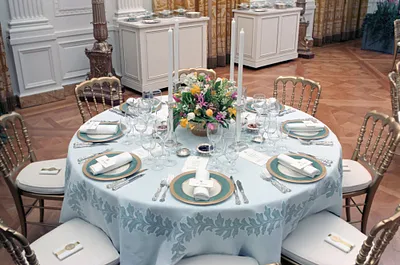 Table settings flowers and china for the President's 70th birthday party in the East Room