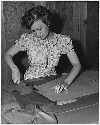 NYA:Minnesota:young woman learning to sew