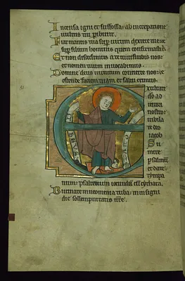 Leaf from the Touke Psalter: Psalm 80, Initial ""E"" with Saint Matthew Trampling Zaroes