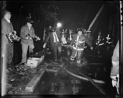 CFD personnel carrying a stretcher