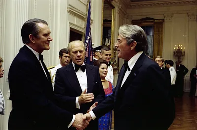 Prime Minister Malcolm Fraser of Australia Shaking Hands with Actor Gregory Peck and President Gerald R. Ford Introduces Them in the Receiving Line at a State Dinner Honoring Prime Minister Fraser