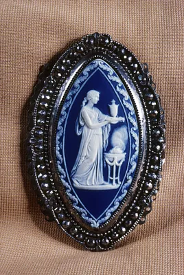 Belt Clasp with a Woman Making a Sacrifice