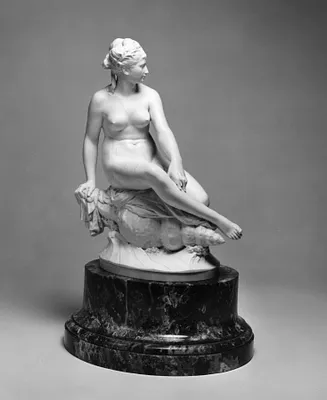 A Nereid Sitting on a Conch Shell