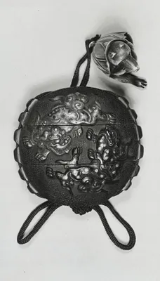 Inro with Lions and Elephant, Netsuke of Badger Sitting in Lotus Leaf