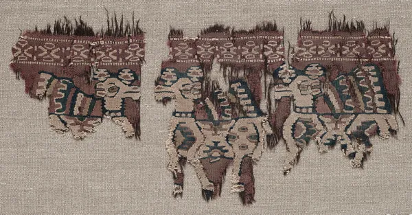 Two Mounted Fragments of a Border (from a Garment ?)
