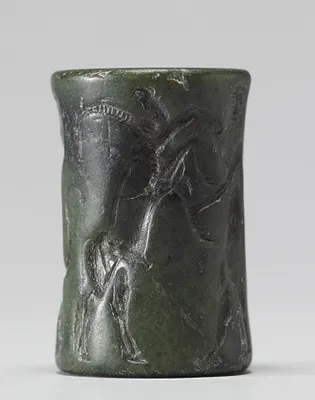 Cylinder Seal with a Contest Scene and an Inscription