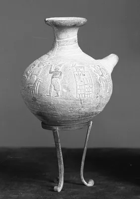 Vase with Decoration of Snake, Seated God, Worshippers, Goat