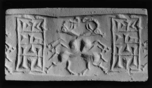 Cylinder Seal with Intertwined Goats and an Inscription