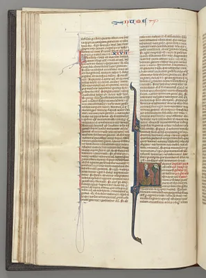 Fol. 46v, Numbers, historiated initial L, Moses with horns, kneeling before God