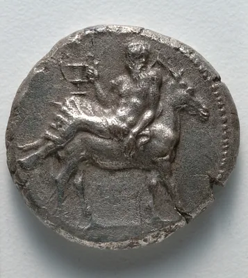Tetradrachm: Dionysos with Kantharos on Donkey (obverse)