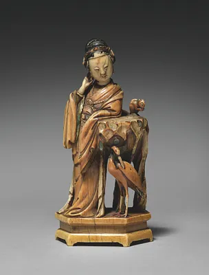 Female Figure with Crane and Squirrel