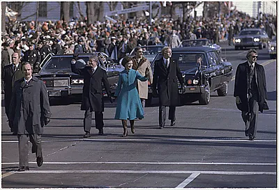 President Jimmy Carter and Rosalynn Carter walk down Pennsylvania Avenue during Inauguration.