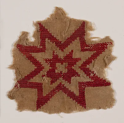 Fragment with embroidered concentric eight-pointed stars