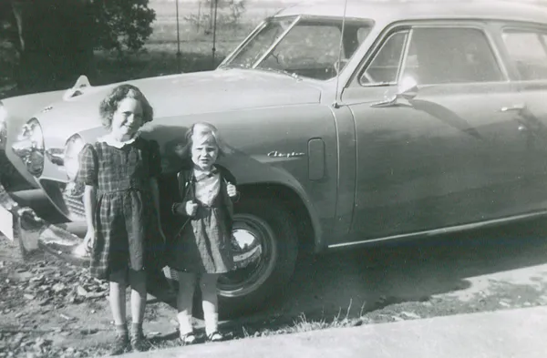 Becky & Audrey by Dad’s Studebaker, 1950
