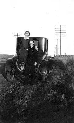 Woman on Vintage Car Near Osborne Park, IA, 1923
