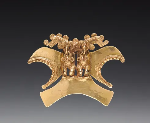 Double Bird-Headed Figure Pendant