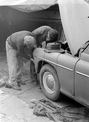 Two Men Working on a Vintage Car, 1968
