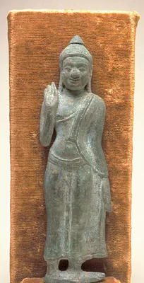 Walking Buddha, in High Relief