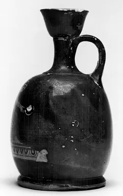 Squat Lekythos Depicting a Seated Woman
