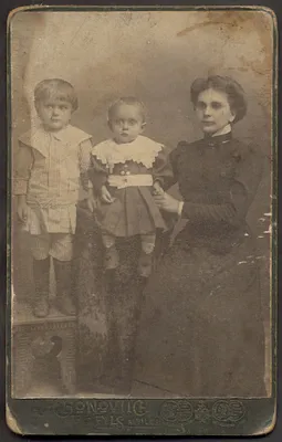 14002