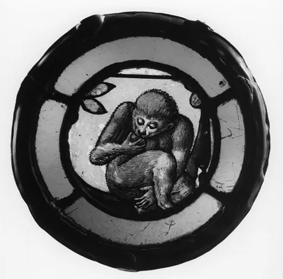 Roundel with Monkey Eating Fruit