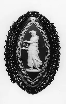 Belt Clasp with a Woman Making a Sacrifice