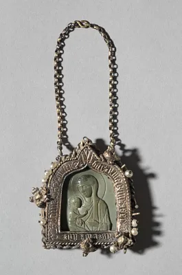 Pendant Icon with the Virgin "Dexiokratousa" and Frame with Winged Bull of Saint Luke on the back