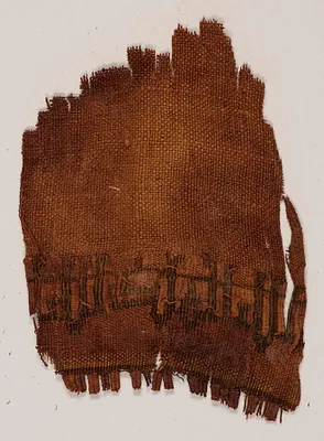Tiraz fragment with tapestry woven inscrition