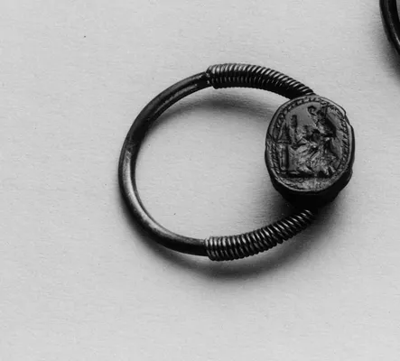Scaraboid Intaglio with a Seated Deity Set in a Swivel Ring