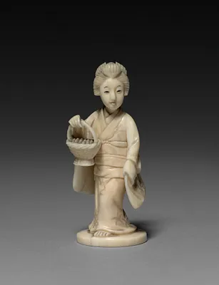 Woman Carrying a Basket